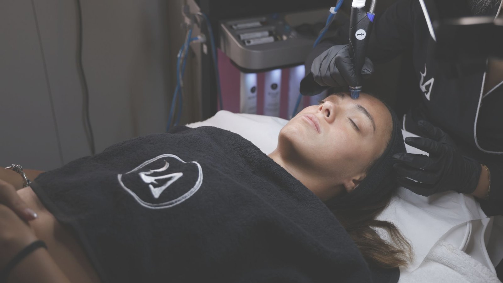 Professional skin treatment being performed at RA Clinics.